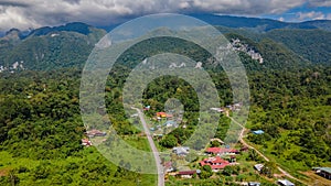 Mulu village with tropical forest and mountains near Gunung Mulu national park. Borneo. Sarawak.