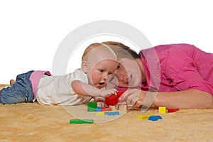 Mum and baby playing with building blocks