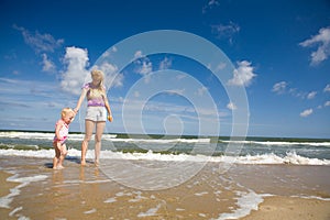 Mum and child on the seashore