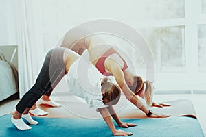 Mum And Daughter Are Doing Athletics At Home.