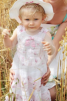 Mum with the doughter in the field