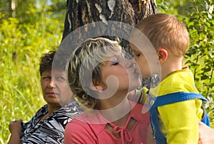 Mum kisses the son