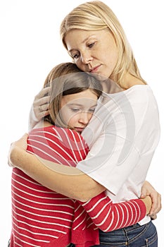Mum with a teenager daughter hugging, white background