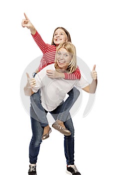 Mum with a teenager daughter laughing and hugging, isolated on white background. Tenderness and love
