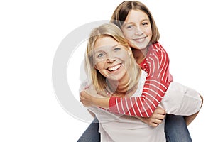 Mum with a teenager daughter laughing and hugging, isolated on white background. Tenderness and love