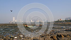 Mumbai, India - December 25, 2017: View of the city from water. Pollution.