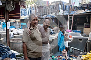 Workers washing clothes at Dhobi Ghat in Mumbai, India