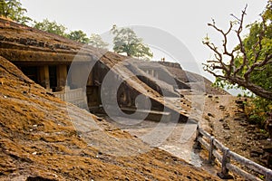 Mumbai, India: Kanheri Caves exterior which is a group of caves and rock-cut monuments cut into a massive basalt outcrop in the