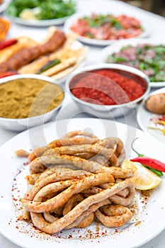 Mumbar, Traditional Turkish Stuffed rice into sheep intestines or offal food on the table in Turkish Restaurant.