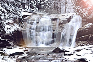 Mumlavsky waterfall in the Czech Republic in winter