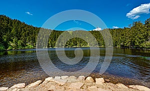 The Mummelsee in the Black Forest surrounded by mountains_Baden-Wuerttemberg, Germany, Europe