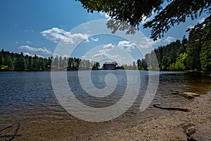 The Mummelsee in the Black Forest surrounded by mountains_Baden-Wuerttemberg, Germany, Europe