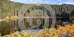 Mummelsee lake and mountain Hornisgrinde in Seebach in the Black Forest landscape nature autumn fall panorama in Germany