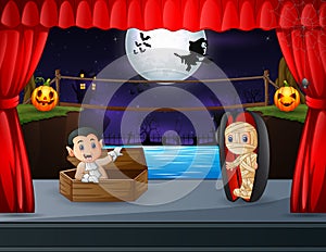 Mummy and vampires out of the coffins on halloween stage