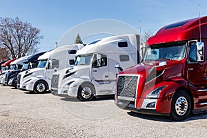 Colorful Volvo Semi Tractor Trailer Trucks Lined up for Sale. Volvo is one of the largest truck manufacturers V