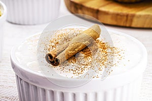 MungunzÃÂ¡, or Canjica, a traditional sweet of the Brazilian June festivals, crushed corn, cooked in a broth of milk, sugar, photo