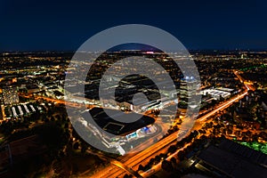 Munich from above at night, fantastic view over the lights of the beautiful bavarian capital as wallpaper eyecatcher.