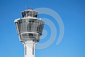 Munich air traffic control tower against clear blue sky