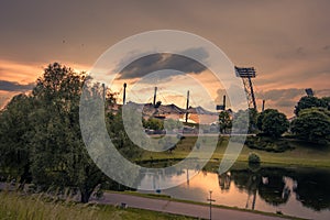 MUNICH, BAVARIA - GERMANY - MAY 30 2017: Olympic Park. Olympic Stadium Munich. View to Olympic Stadium from top point. Evening