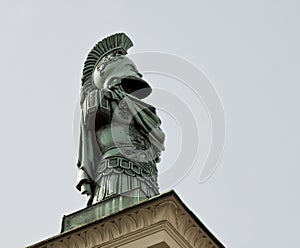 Munich, Germany - Hofgarten, bronze statue on entrance portal
