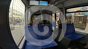 Munich. Germany. Interior of streetcar in Munchen Deutschland. Inside tram with blue seats in Muenchen. Public