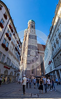Munich, Germany - July 6, 2022: Looking up at the two towers of the Frauenkirche MÃÂ¼nchen. Cathedral of Our Dear Lady is a