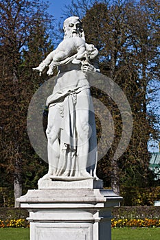 Munich, god Saturn statue in Nymphenburg park