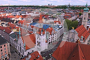 Munich historical center panoramic aerial cityscape. Old City Hall, Heiliggeist Church Heiliggeistkirche and red tile roofs
