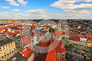 Munich historical center panoramic aerial cityscape. Old City Hall, Heiliggeist Church Heiliggeistkirche and red tile roofs