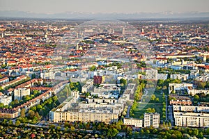 Munich housing estates, old town and Bavarian Alps aerial view