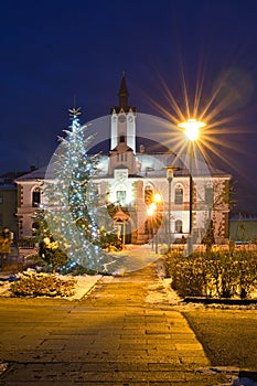 Municipal office in Lubietova village during winter evening