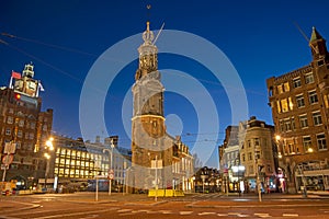 The Munt tower in Amsterdam the Netherlands at sunset photo