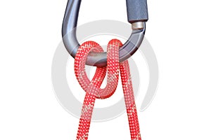 Munter hitch tied with red rope on carabiner, isolated on white background.