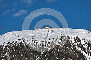 Muottas muragl. Engadine valley above Sankt Moritz. The sled track photo