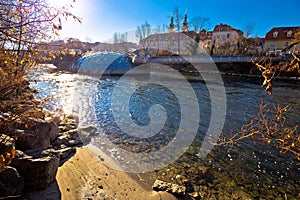 Mur river beach and Murinsel in Graz view