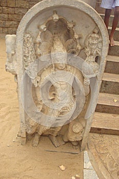 Muragala or muru gal, also known as a guardstone, are a unique feature of the Sinhalese architecture of ancient Sri Lanka. photo