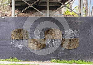 A mural by Alli Koch at the underpass where the historic Katy Trail passes over Hall Street in Uptown, Dallas, Texas.