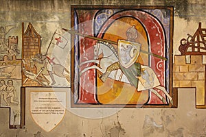 Mural. Painted wall depicting a knight. Carcassonne. France