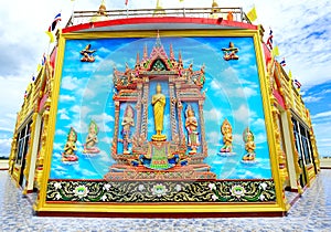 Mural and sculpture thai style on the wall of buddhist temp