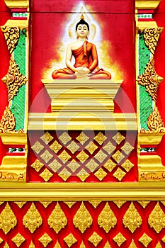 The mural and sculpture thai style on the wall of buddhist temp