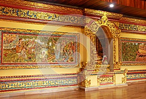 Murals and carvings of Brahma vihara arama. Carved Picture on the temple wall, Bali, Indonesia