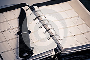 Murder planning concept - calendar and knife