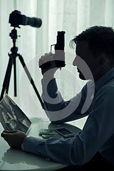 Murderer holding handgun