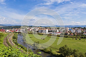 Mures river, Toplita city and mountain landscape on background