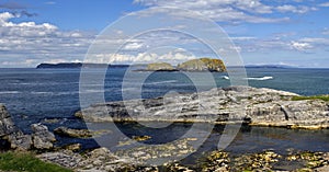 Murlough Bay and across the sea to the Mull of Kintyre Scotland, Antrim Coast