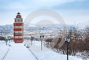 Murmansk city in winter. Lighthouse - a memorial to sailors who died in peacetime. Kola Peninsula.