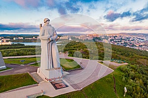 Murmansk, Russia - July 1, 2019: Aerial view panorama of city monument Defenders of Soviet Arctic Alyosha