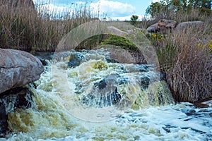 The murmuring waters of the Tokovsky waterfall in Ukraine. photo