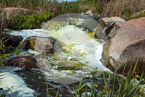 The murmuring waters of the Tokovsky waterfall in Ukraine. photo