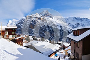Murren village, Switzerland. Winter mountain landscape. Village among the mountains. Chalets and vacation homes.